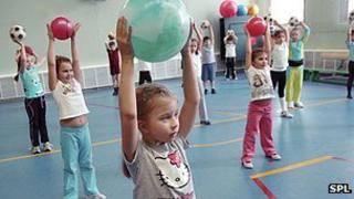Children exercising in a school gym