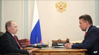 Russian Prime Minister Vladimir Putin (left) and Gazprom CEO Alexei Miller at Mr Putin's residence outside Moscow, 30 December 2011
