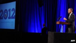 US President Barack Obama speaks at a campaign event in Washington, DC, on 13 December 2011