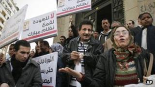 Egyptian Social Democratic party supporters attend a demonstration calling for human rights to be respected in a Cairo protest