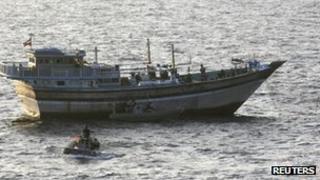 US Navy sailors board the Al-Molai