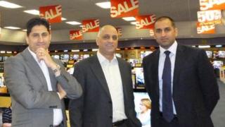 Madan Showan (centre) and his two sons