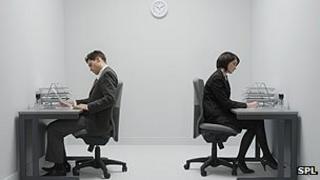 Workers sitting at their desks