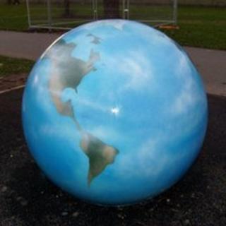 Concrete sculpture of Earth