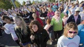 45,000 people participate in a march in aid of breast cancer organised by Susan G Komen for the Cure in Little Rock, Arkansas 16 October 2012