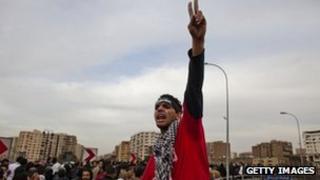 A protester shout slogans during a demonstration against Egypt's military rulers