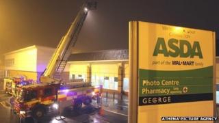 Firefighters outside the store