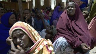 Somalis queue at a food aid distribution centre in Mogadishu