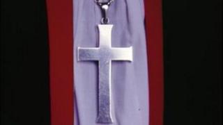 Cross and clothing of Church of England Bishop