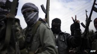 Syrian rebel fighters in Qusayr, 15km from Homs, Syria (1 March 2012)