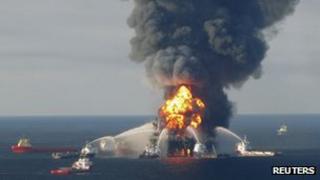Fire boat response crews battle the blazing remnants of the offshore oil rig Deepwater Horizon, off Louisiana
