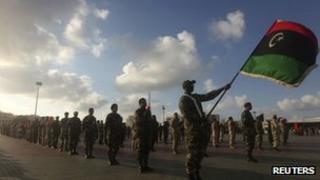 Soldiers from the National Army of Cyrenaica take part in a military parade graduation ceremony in Benghazi on 3 march 2012