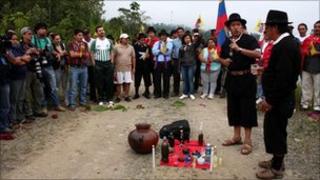 Indigenous Ecuadorian protesters take part in a ceremony at the start of the protest march