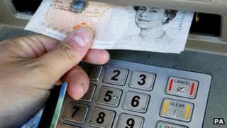 Taking cash from a cash machine