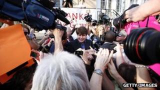 Former governor Rod Blagojevich greets supporters outside his home on 14 March 2012, Chicago, Illinois