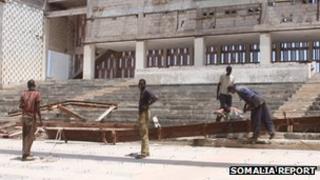 Workers rebuilding the Somali National Theatre