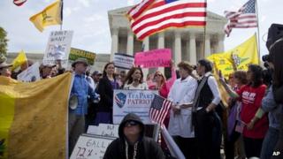 Rep. Michele Bachmann and opponents of healthcare law in front of the Supreme Court in Washington on 28 March 2012