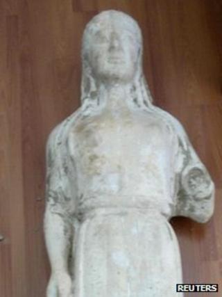 Undated Greek police handout of an 'ancient 'statue later found to be fake