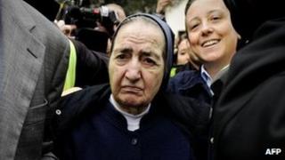 Sister Maria Gomez leaving court after being questioned over the alleged theft of a baby in the 1980s