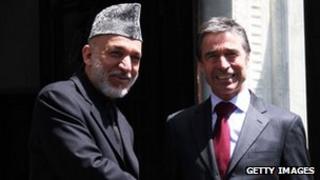 President Karzai (left) with Nato Secretary General Anders Fogh Rasmussen