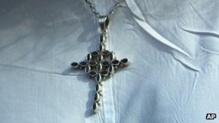 Cross worn around the neck