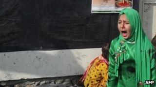 Tarana Akbari crying after a suicide bomber's attack at a shrine in Kabul