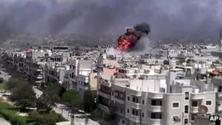 Amateur video purporting to show an explosion in Homs, Syria, on 20 April