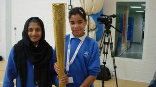 School Reporters hold Olympic Torch