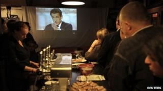 People in a Parisian cafe watch the presidential debate, 2 May