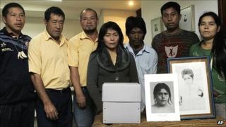 Aceh community members in Paraguay with a box containing the returned skull of Damiana Kryygi