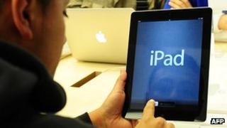 A consumer using iPad