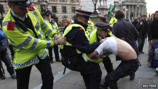Demonstrators and police clash during the protest