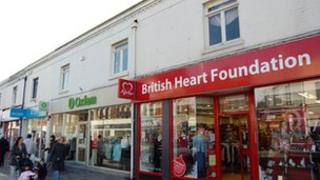 row of charity shops in high street