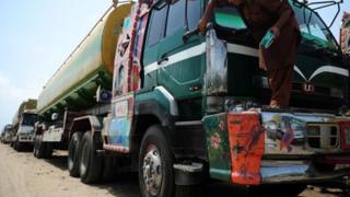 A Pakistani truck - used to transport fuel to Nato forces in Afghanistan - parked near oil terminals in the port city of Karachi