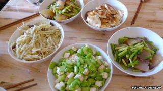 Bowls of food including stir-fried cheese with broad beans