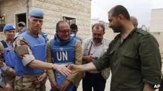 Maj Gen Mood with a Syrian security officer in Hama, 3 May 2012