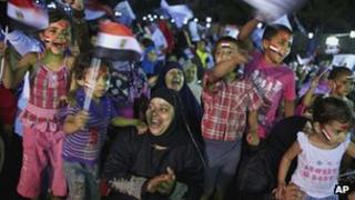 Children wave Egyptian national flags at a rally in support of the Muslim Brotherhood candidate Mohammed Mursi