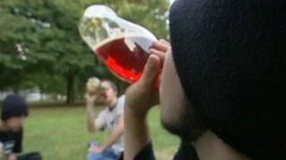 Young men drinking alcohol