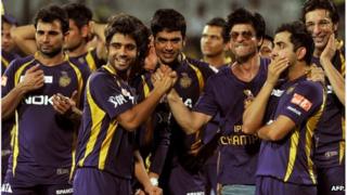 Kolkata Knight Riders owner and Bollywood actor Shah Rukh Khan (3rd R) celebrates with his teammates after they won the DLF IPL Twenty20 Champions Trophy in a final match against Chennai Super Kings at the M.A. Chidambaram Stadium in Chennai on May 27, 2012.