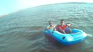 Dinghy drifting off the coast at Rhyl