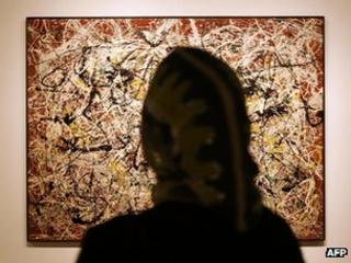 Woman views Jackson Pollock's Mural on Indian Red Ground