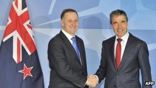 Nato Secretary General Anders Fogh Rasmunsen, right, shakes hands with Prime Minister of New Zealand John Key on 4 June, 2012