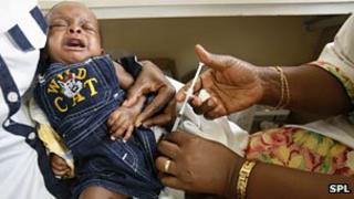A young child being vaccinated