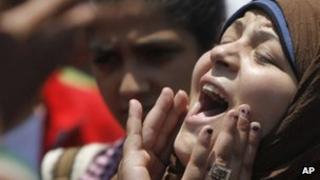 An Egyptian protester chant slogans during a demonstration in Tahrir Square, June 2012