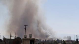 Picture of smoke rising in Talbisa provided by opposition Shaam News Network(AFP/HO/Shaam News Network)