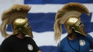Greek football fans in helmets, Warsaw (16 June)