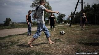 Members of the Street Child World Cup Ukraine team play football