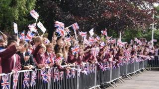 Pupils from Selby High School await the torch's arrival