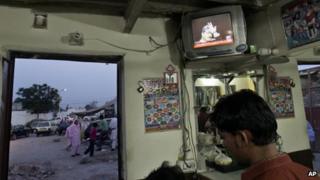 A TV broadcast showing Pakistani Prime Minister Yousuf Raza Gilani