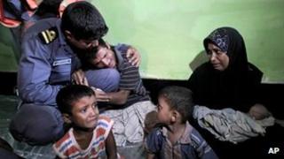 Mohammad Rafique, a Rohingya Muslim from Myanmar begs a border guard to let him and his family stay in Bangladesh